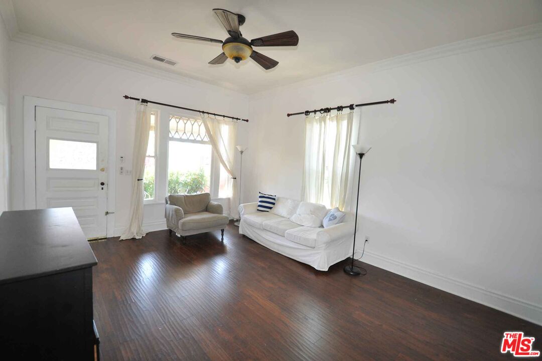 2315 2nd Street, Unit A Santa Monica, CA 90405 - Photo 4 of 17 a living room with furniture and a large window