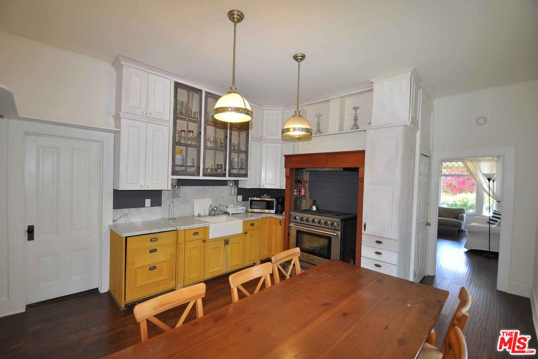 2315 2nd Street, Unit A Santa Monica, CA 90405 - Photo 6 of 17 a view of a kitchen with a sink cabinets and wooden floor