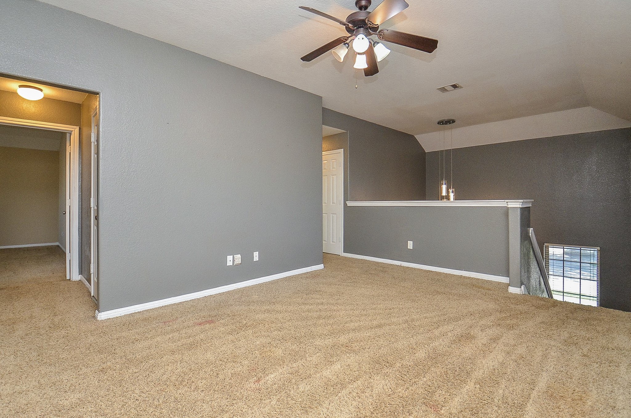 5411 Rio Drive Baytown, TX 77521 - Photo 15 of 30 Upper-level area with natural light and an open, versatile layout makes it ideal for various uses.