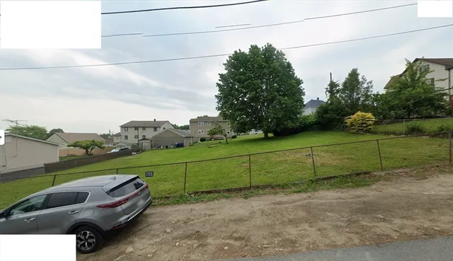 a view of a yard with outdoor seating