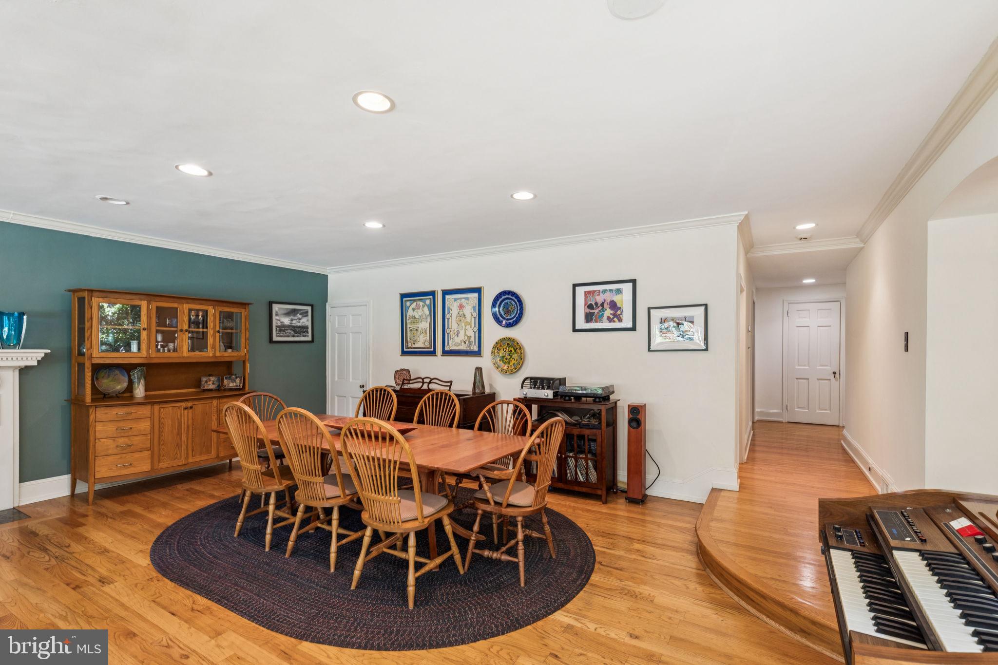 744 Clarendon Road Penn Valley, PA 19072 - Photo 14 of 41 a view of a dining room with furniture wooden floor and window