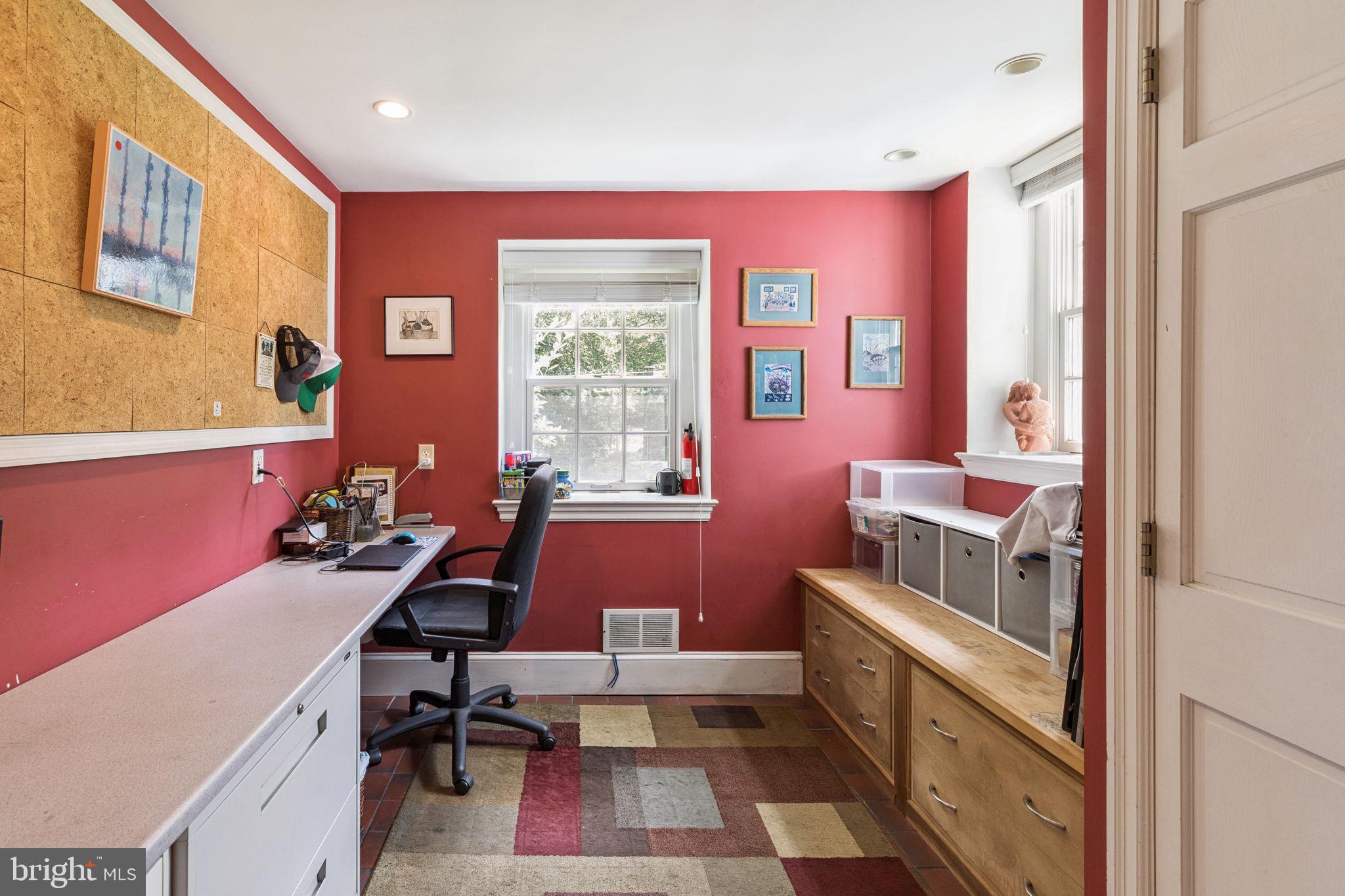 744 Clarendon Road Penn Valley, PA 19072 - Photo 18 of 41 a room with furniture a rug and a window