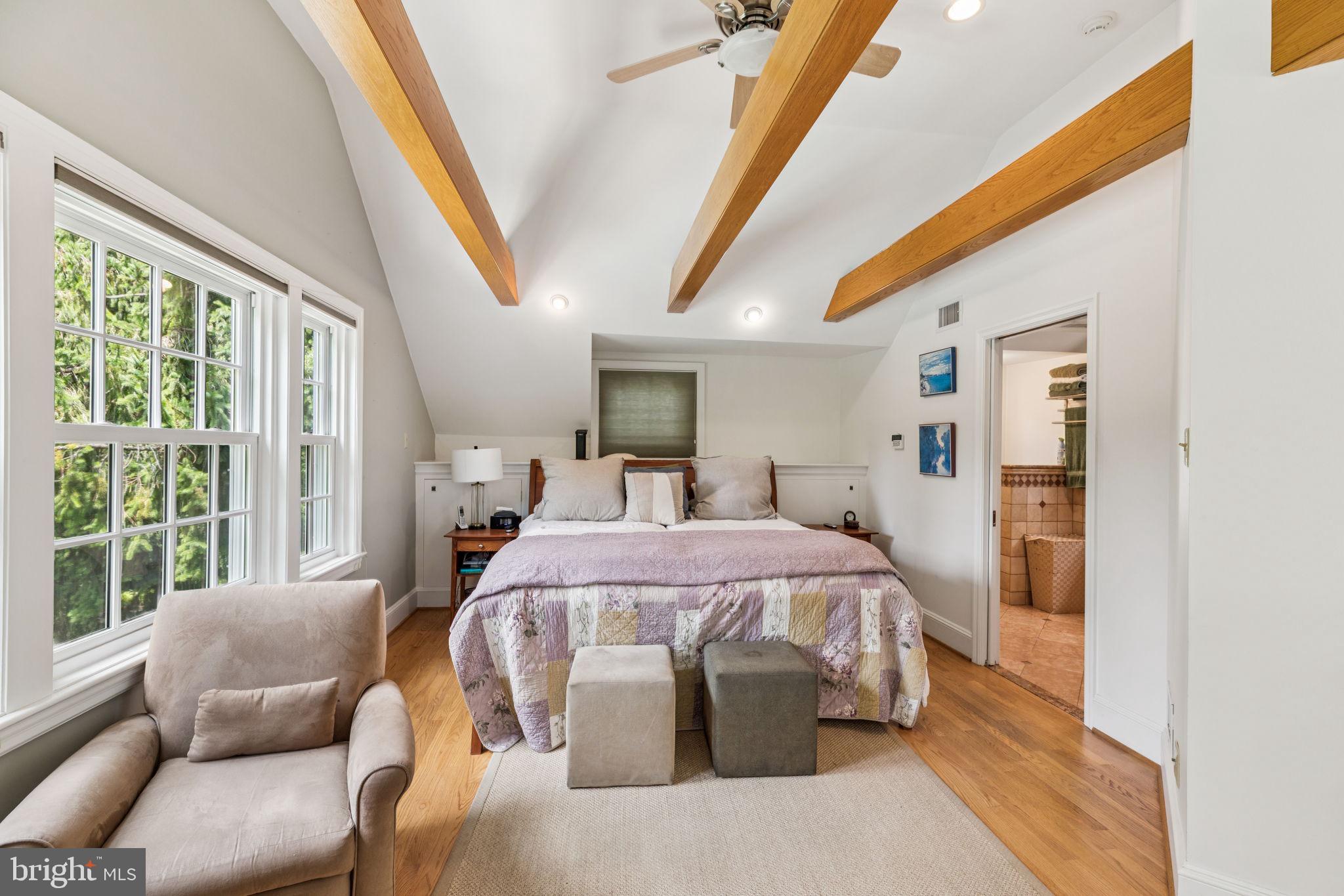 744 Clarendon Road Penn Valley, PA 19072 - Photo 20 of 41 a bed room with a bed and a couch