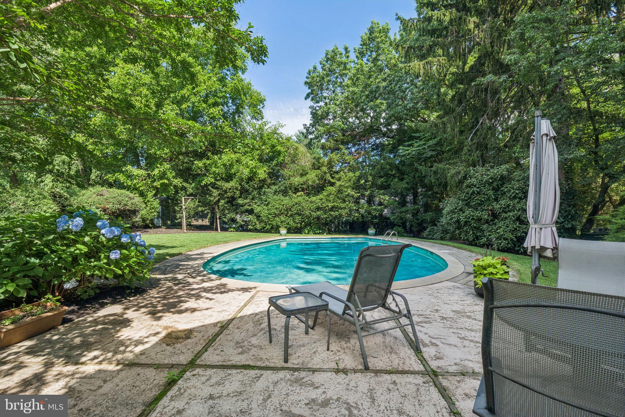 744 Clarendon Road Penn Valley, PA 19072 - Photo 2 of 41 a view of a two chairs in a backyard