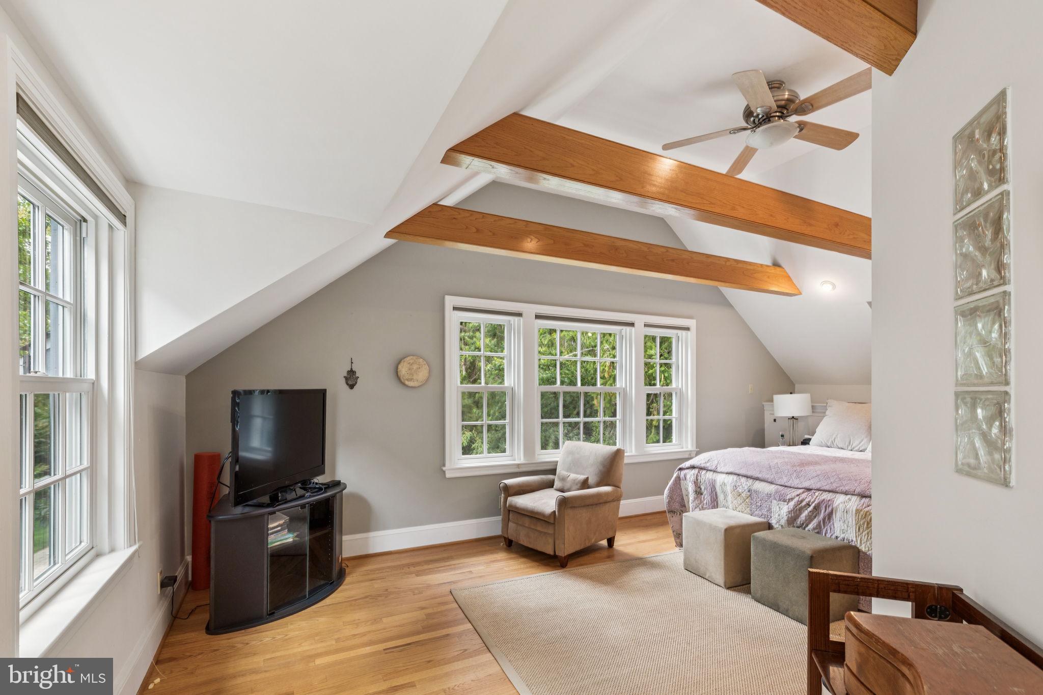 744 Clarendon Road Penn Valley, PA 19072 - Photo 21 of 41 a living room with furniture and a flat screen tv