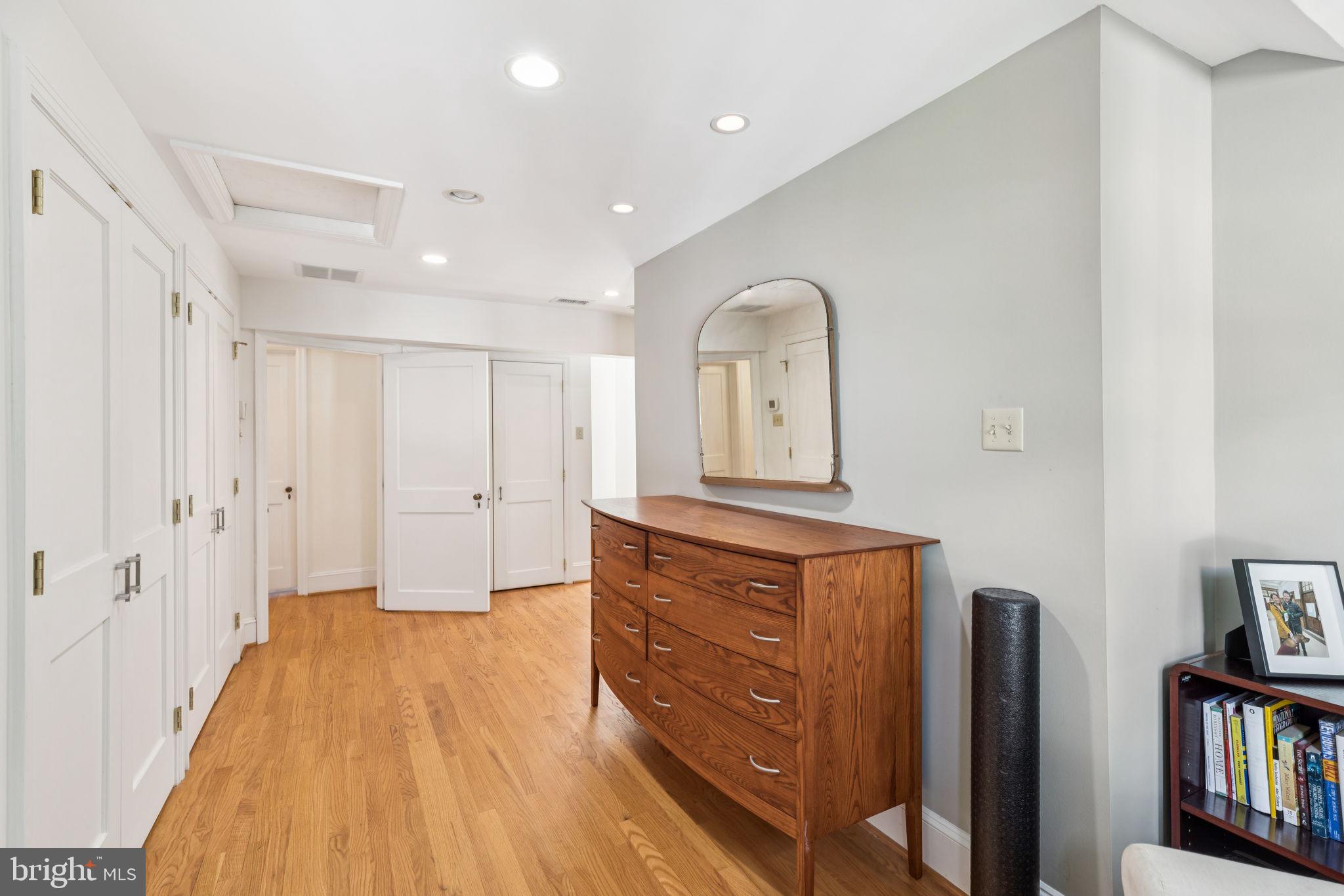 744 Clarendon Road Penn Valley, PA 19072 - Photo 26 of 41 a view of a bedroom with wooden floor and front door