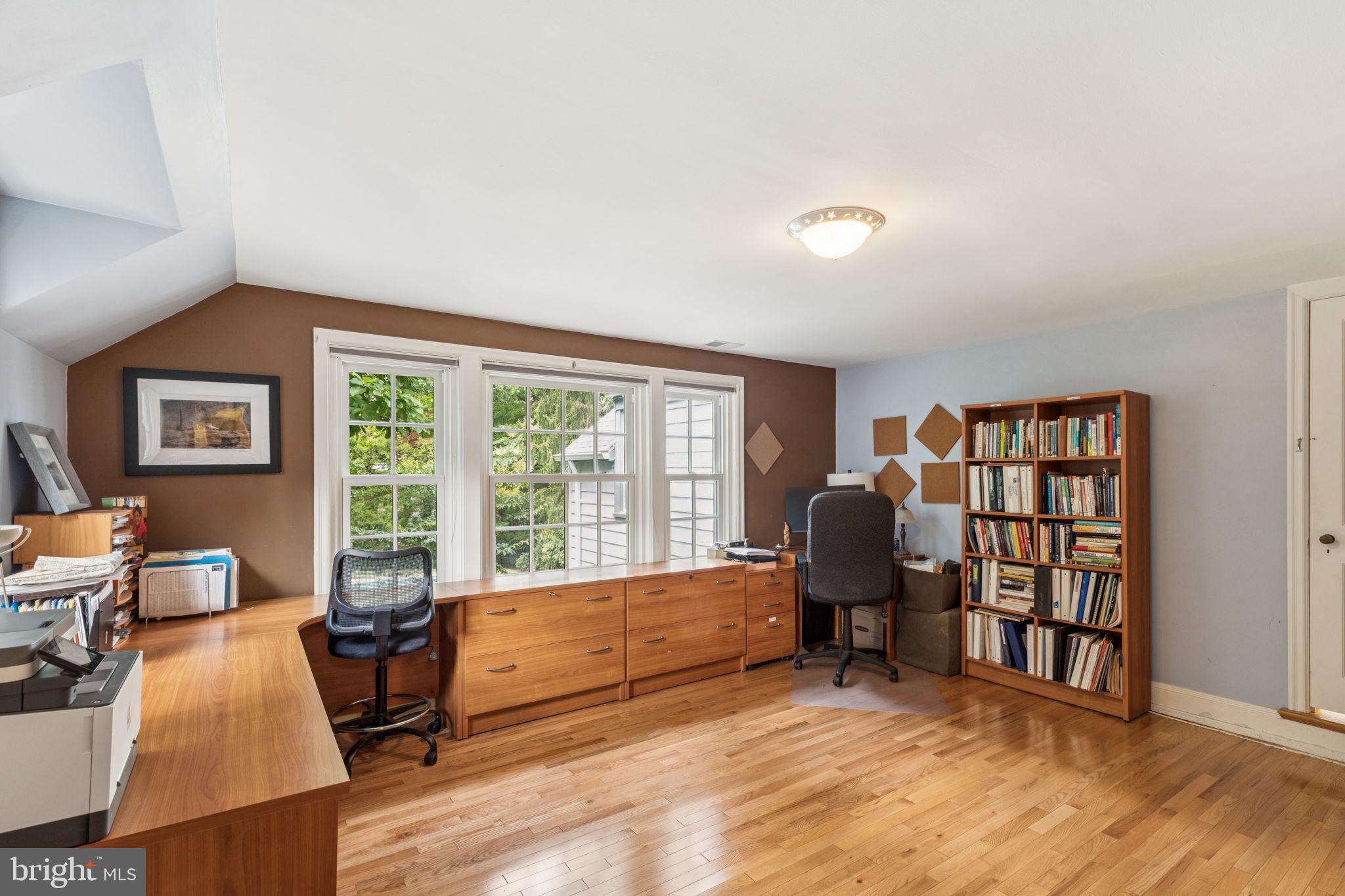744 Clarendon Road Penn Valley, PA 19072 - Photo 30 of 41 a living room with furniture and large window
