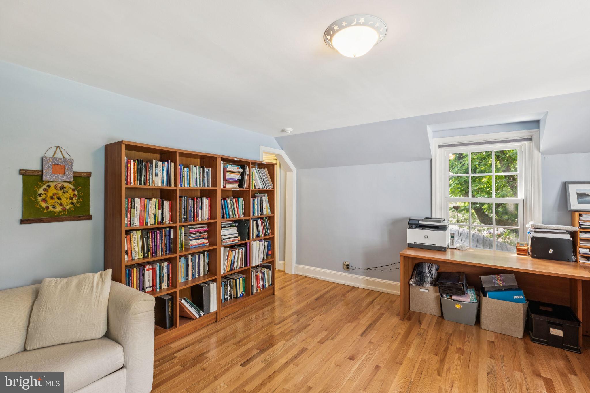 744 Clarendon Road Penn Valley, PA 19072 - Photo 31 of 41 a workspace with furniture window and wooden floor
