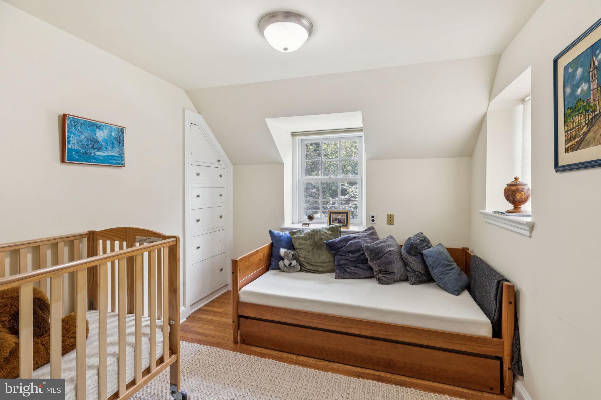 744 Clarendon Road Penn Valley, PA 19072 - Photo 34 of 41 a bed room with furniture and a window