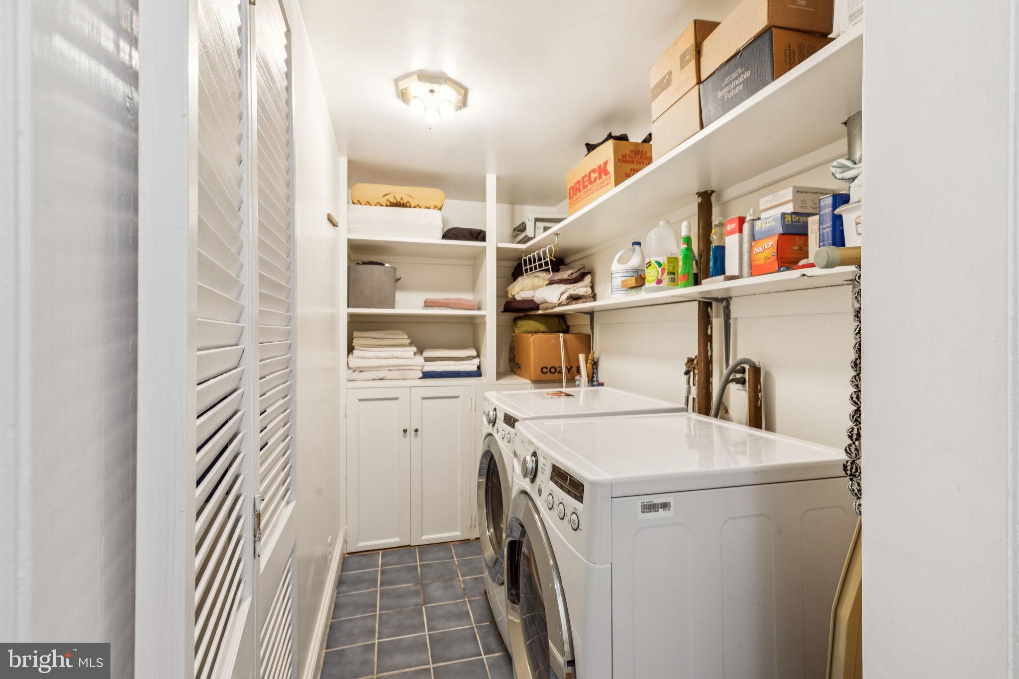 744 Clarendon Road Penn Valley, PA 19072 - Photo 37 of 41 a utility room with dryer and washer