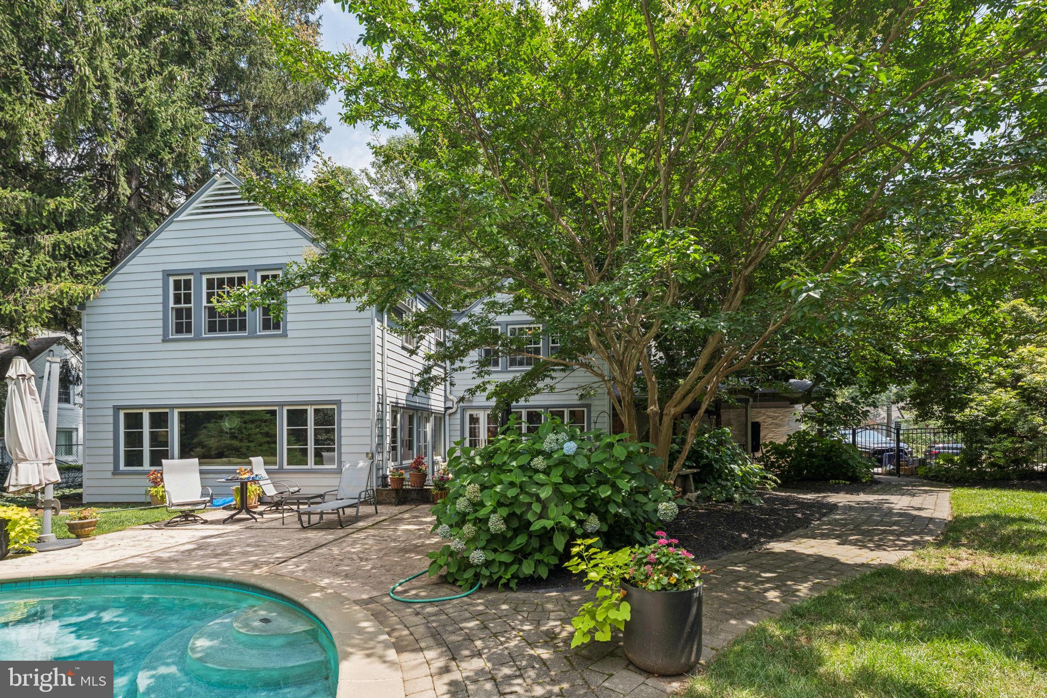 744 Clarendon Road Penn Valley, PA 19072 - Photo 5 of 41 a front view of a house with garden