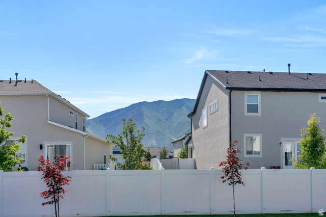 252 North Sunrise Rnch Drive Mapleton, UT 84664 - Photo 52 of 62 Private backyard space featuring a white vinyl fence
