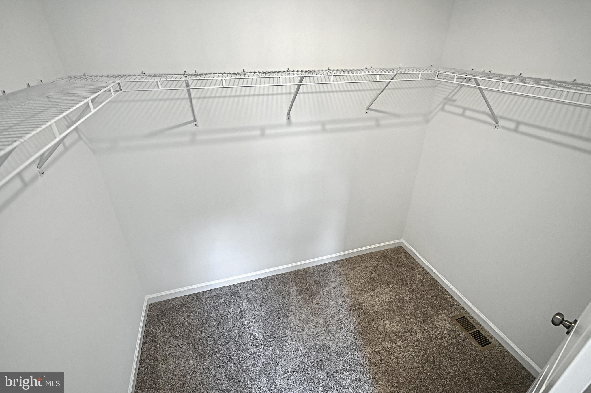 Meriwether Plan At Stone Mill Estates Duncannon, PA 17020 - Photo 19 of 28 a view of a room with racks on the wall