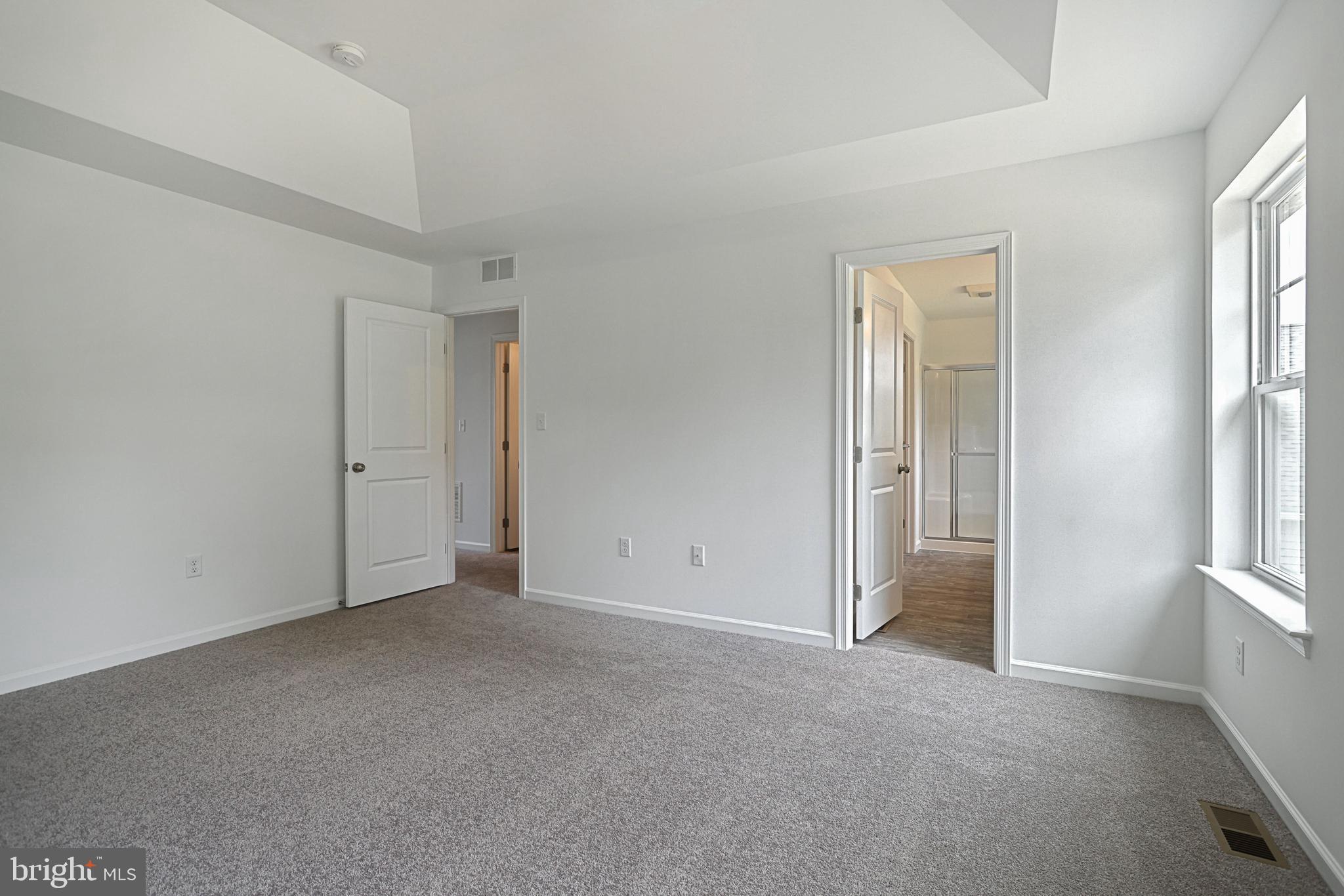 Meriwether Plan At Stone Mill Estates Duncannon, PA 17020 - Photo 22 of 28 an empty room with windows and closet