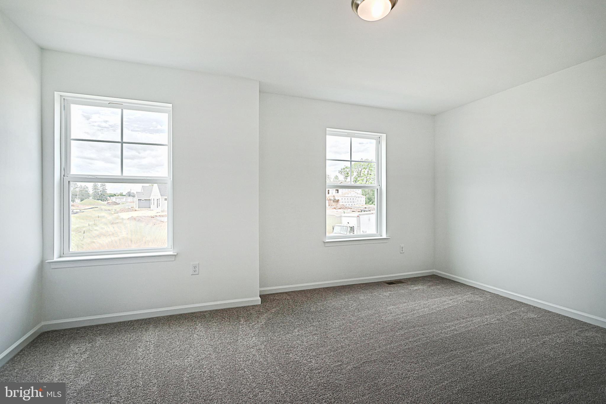 Meriwether Plan At Stone Mill Estates Duncannon, PA 17020 - Photo 25 of 28 an empty room with windows