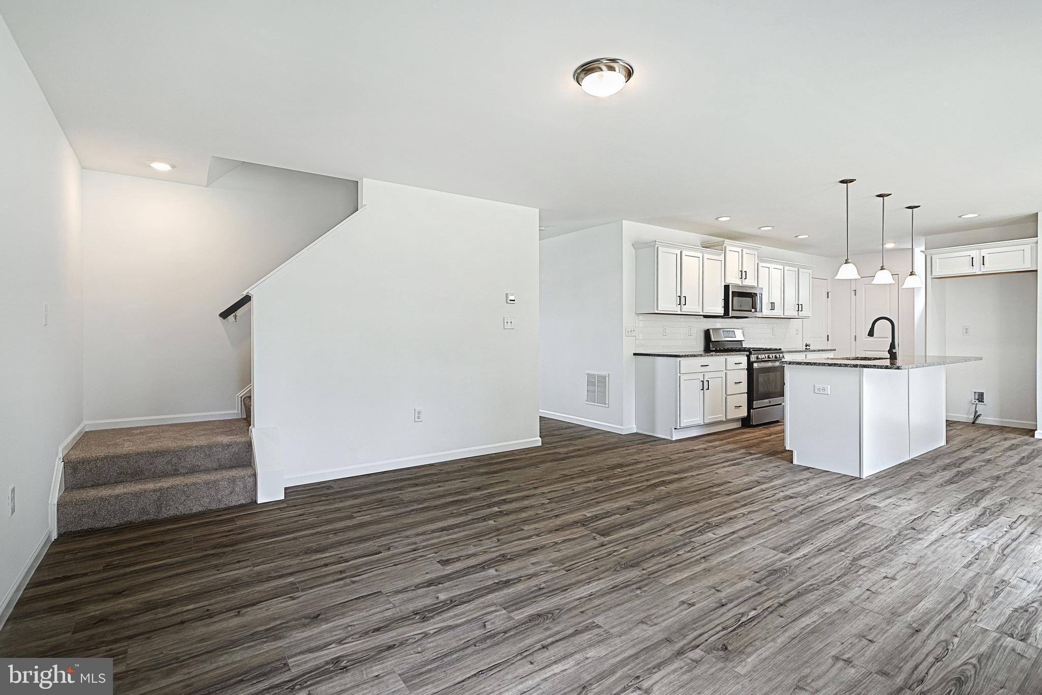 Meriwether Plan At Stone Mill Estates Duncannon, PA 17020 - Photo 8 of 28 a view of kitchen with wooden floor
