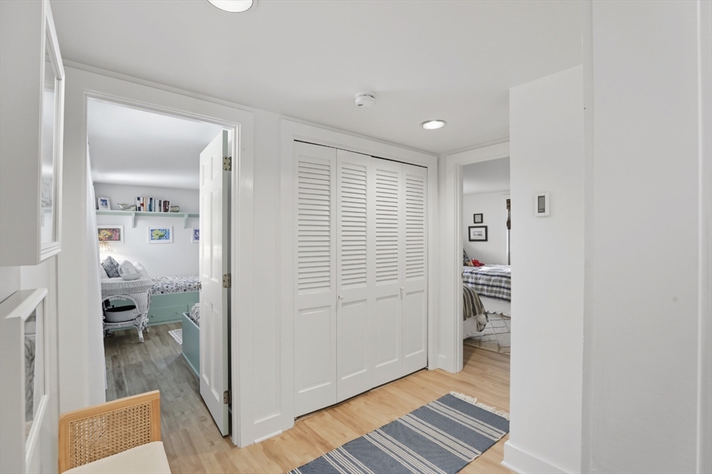 26 Tennessee Avenue Nantucket, MA 02554 - Photo 12 of 40 a view of a hallway with bathroom and wooden floor