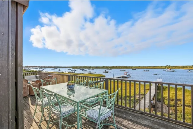 a view of a balcony with lake view