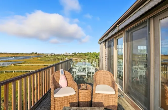 a balcony with an ocean view