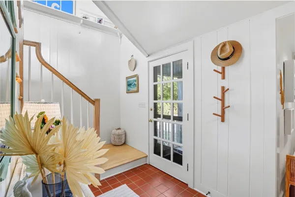 a view of entryway with wooden floor