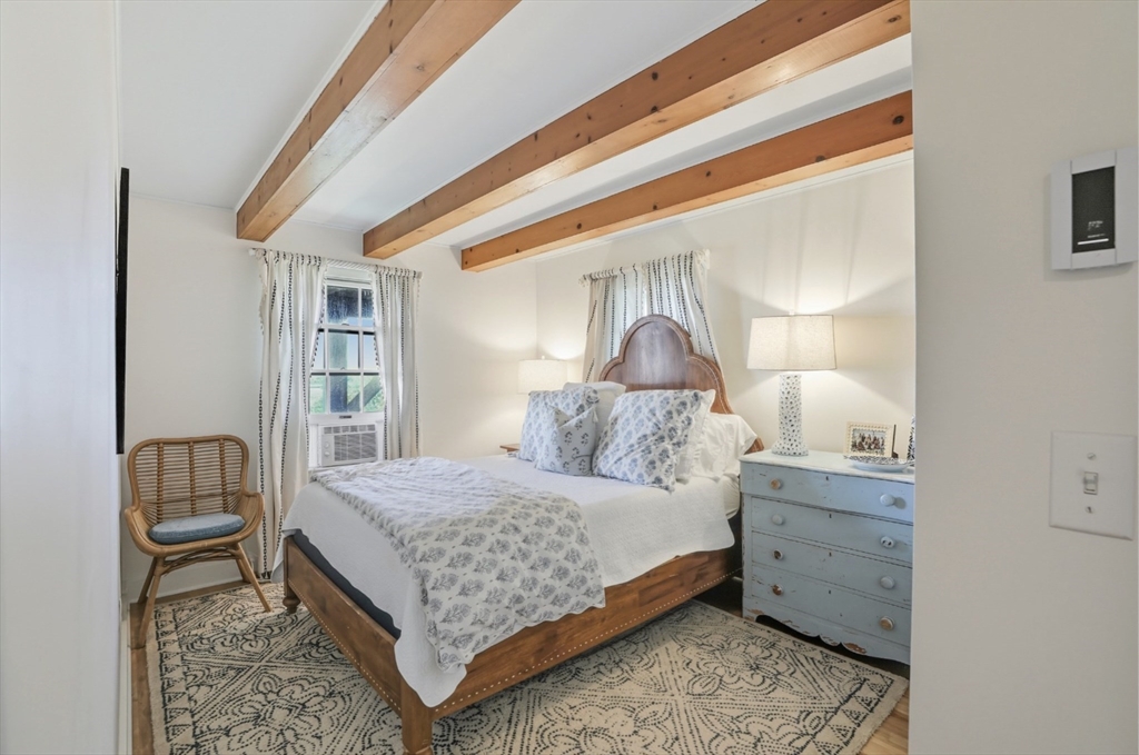 26 Tennessee Avenue Nantucket, MA 02554 - Photo 9 of 40 a bedroom with a bed and window