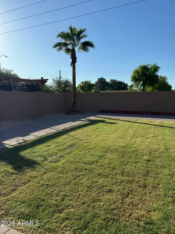 a view of a swimming pool and a chair