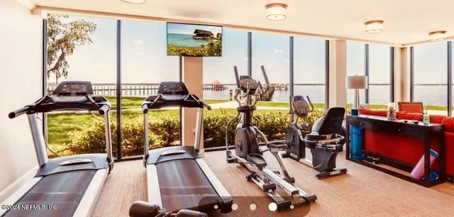 a view of a balcony with wooden floor