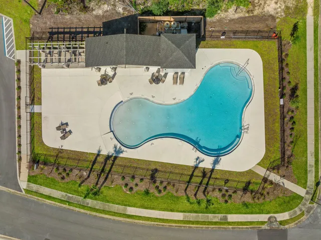 a view of swimming pool with a garden