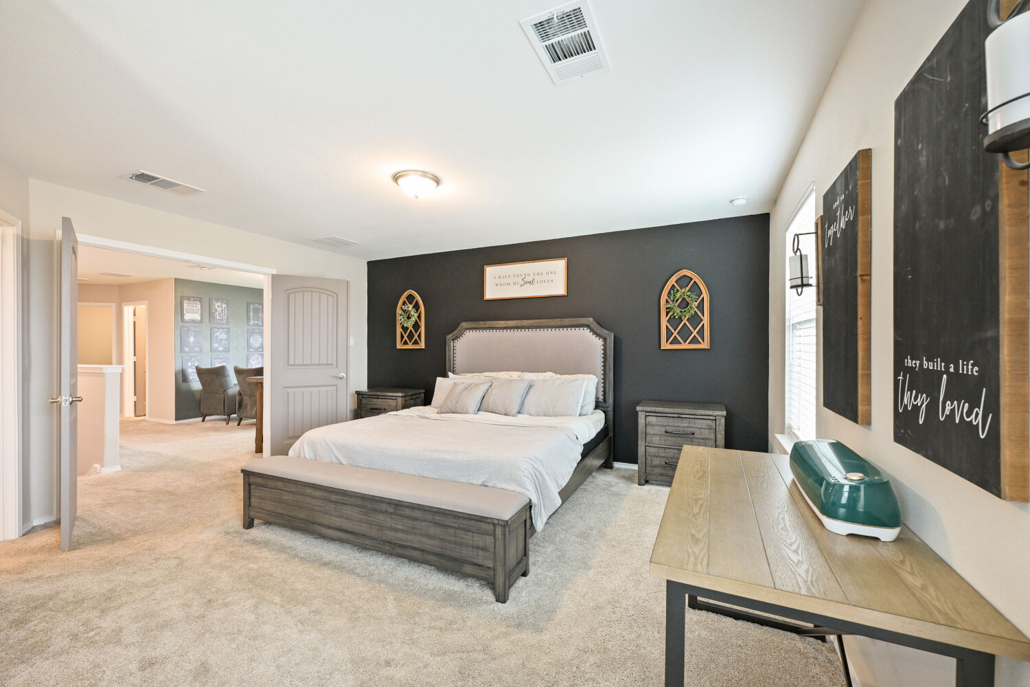 175 Gustaf Trail Kyle, TX 78640 - Photo 1 of 28 Double doors open to large Primary Bedroom w/ accent wall