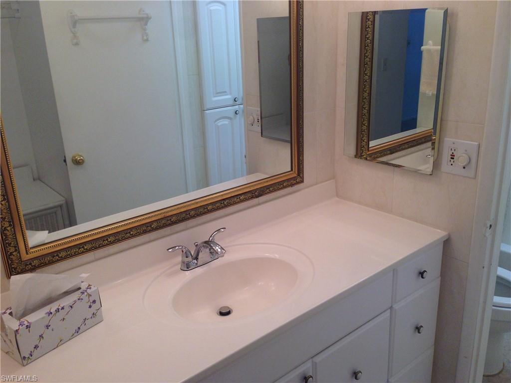 3760 Inverrary Drive, Unit 1W Lauderhill, FL 33319 - Photo 11 of 32 Bathroom with vanity