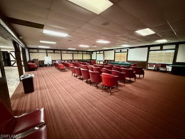 3760 Inverrary Drive, Unit 1W Lauderhill, FL 33319 - Photo 18 of 32 Misc room with carpet flooring and a paneled ceiling