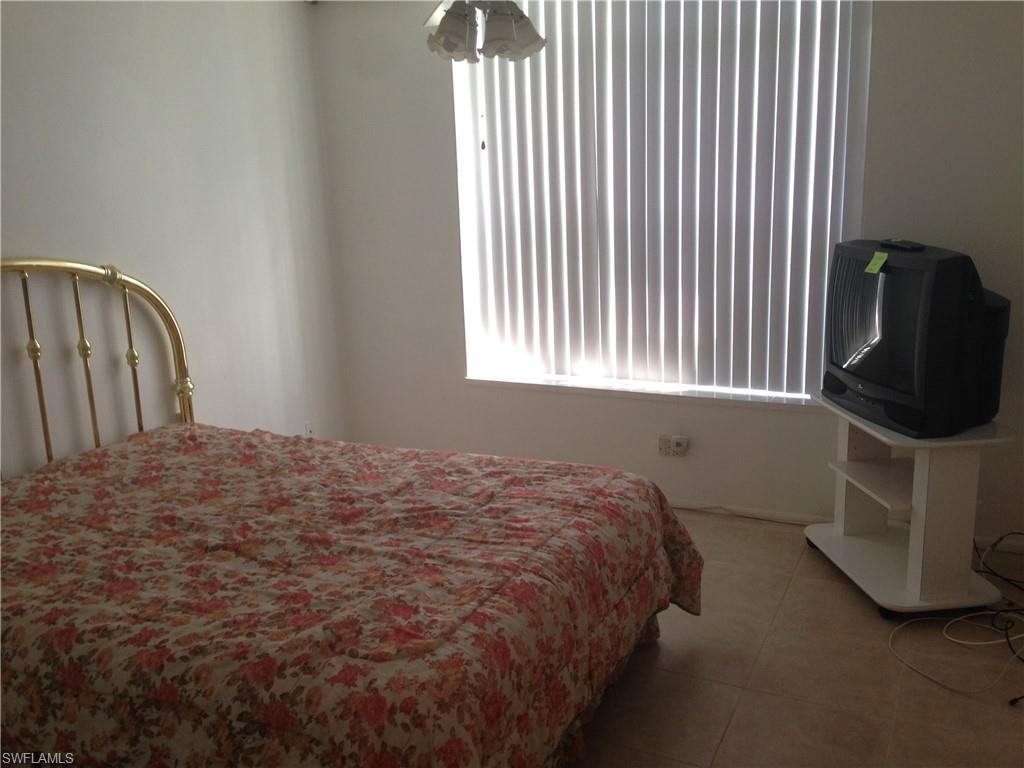 3760 Inverrary Drive, Unit 1W Lauderhill, FL 33319 - Photo 6 of 32 View of tiled bedroom