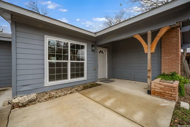 a front view of a house with a garage
