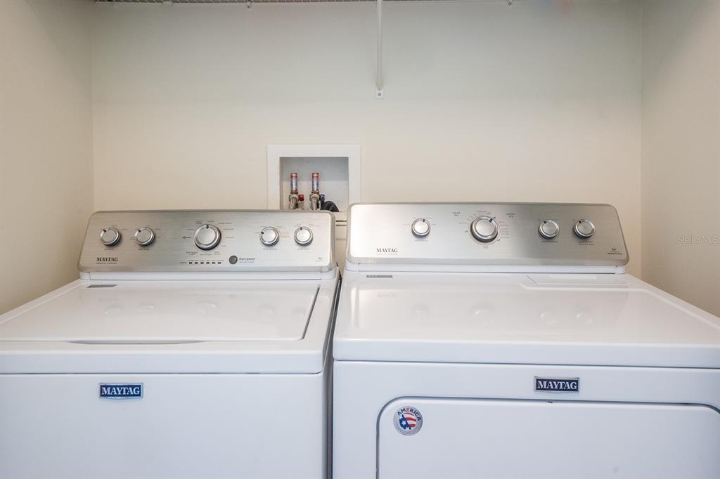 47 Summerwind Circle Palm Coast, FL 32137 - Photo 25 of 32 a close up view of washer and dryer