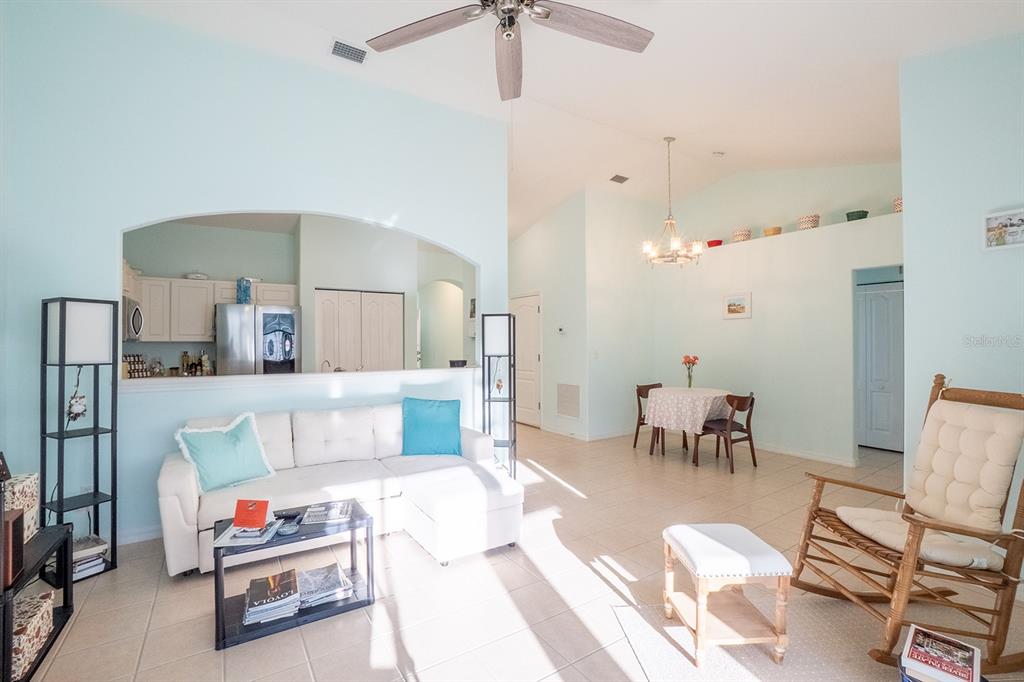 47 Summerwind Circle Palm Coast, FL 32137 - Photo 5 of 32 a living room with furniture and a table