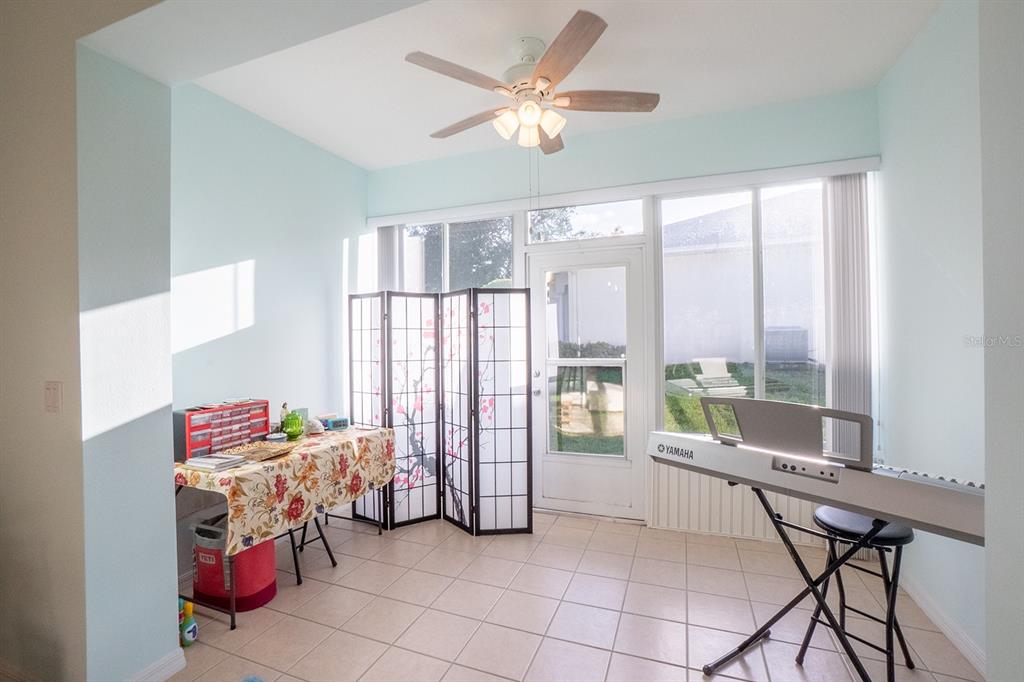 47 Summerwind Circle Palm Coast, FL 32137 - Photo 8 of 32 a bedroom with furniture and a window