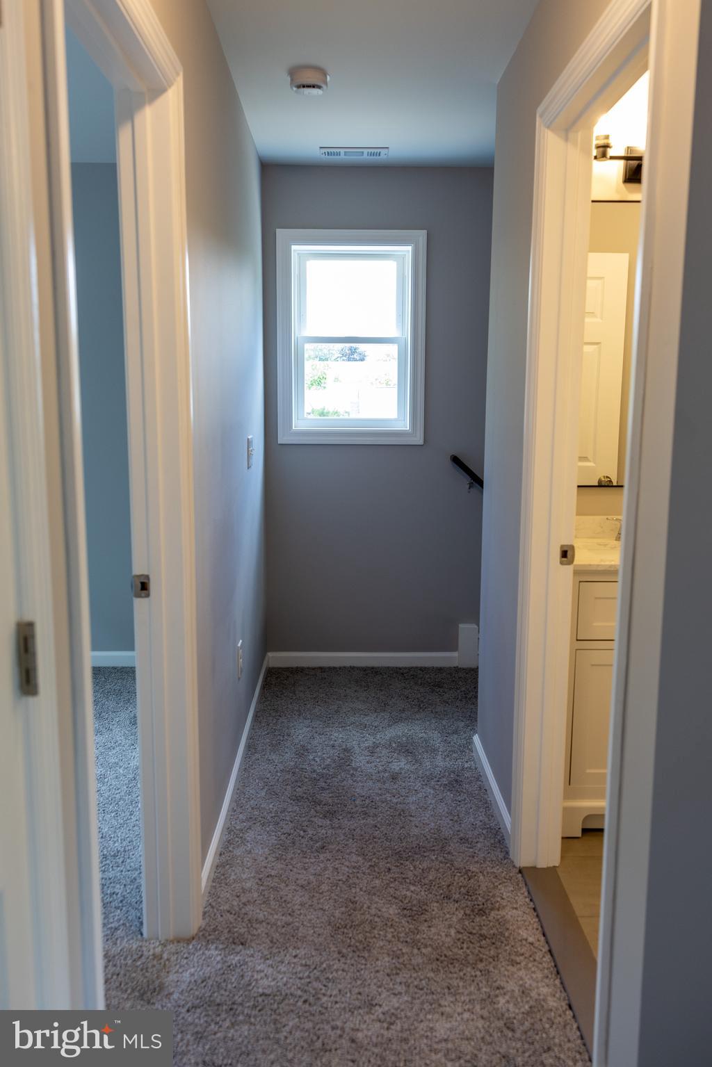 348 Colfax Street Bridgeton, NJ 08302 - Photo 11 of 26 an empty room with windows