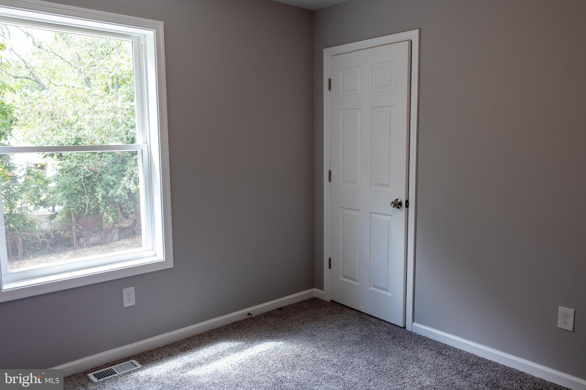 348 Colfax Street Bridgeton, NJ 08302 - Photo 17 of 26 a view of an empty room with a window