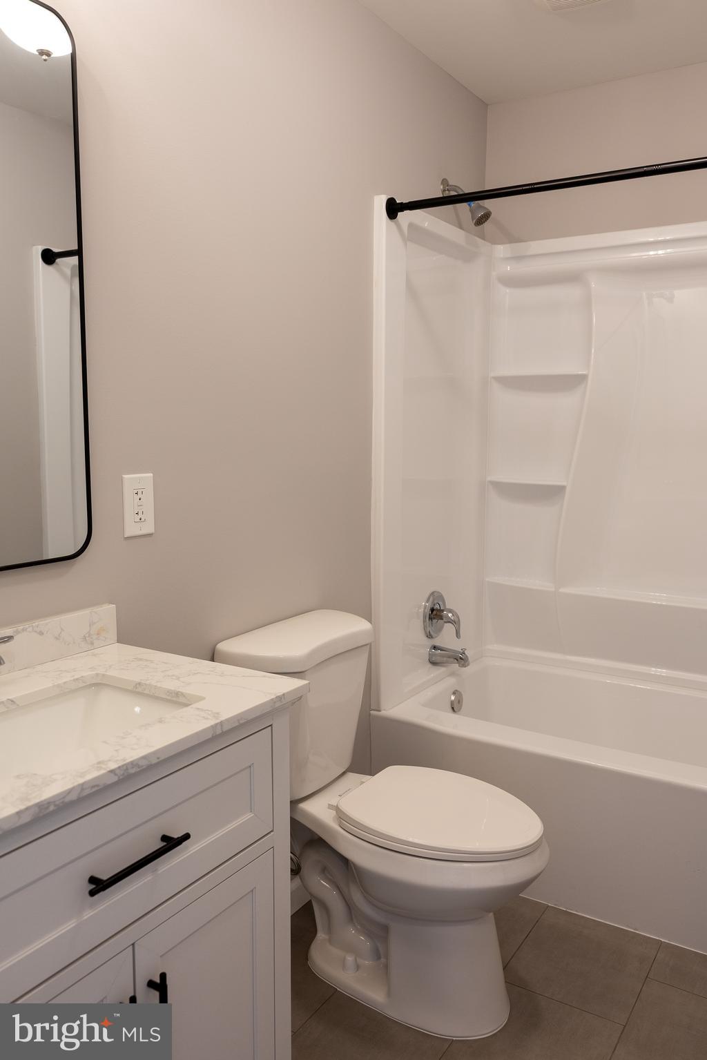 348 Colfax Street Bridgeton, NJ 08302 - Photo 21 of 26 a bathroom with a sink a toilet and shower