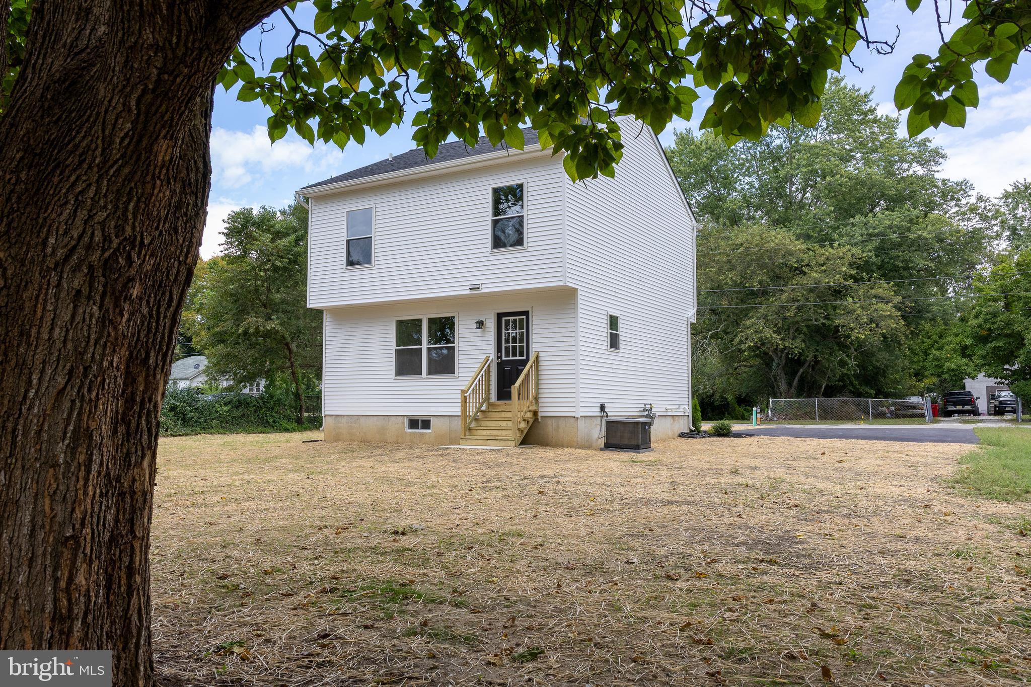 348 Colfax Street Bridgeton, NJ 08302 - Photo 23 of 26 a house with trees in the background