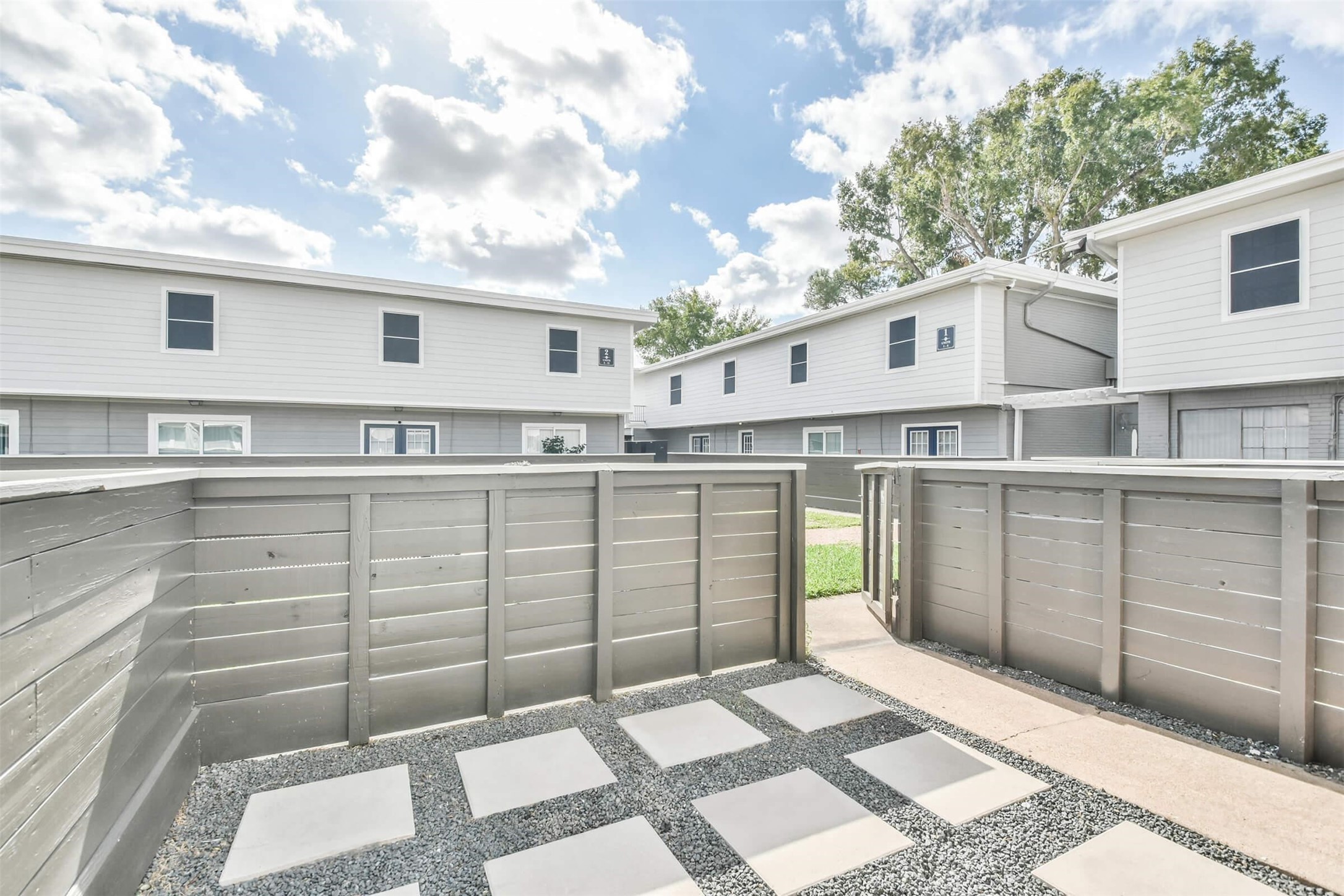 8271 Stone Street, Unit 7107 Houston, TX 77061 - Photo 21 of 28 a view of a house with a backyard