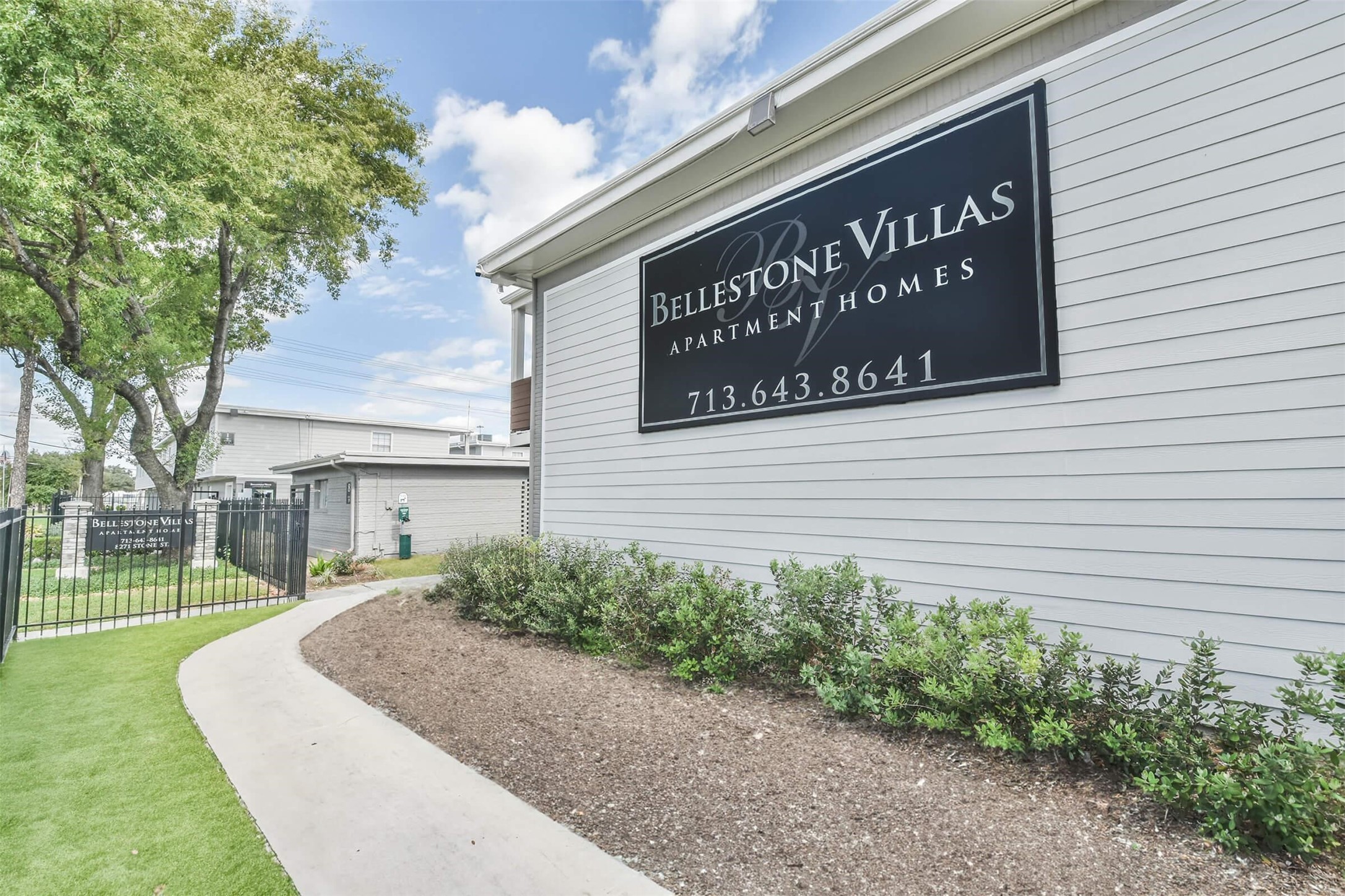 8271 Stone Street, Unit 7107 Houston, TX 77061 - Photo 27 of 28 a sign on the side of a building