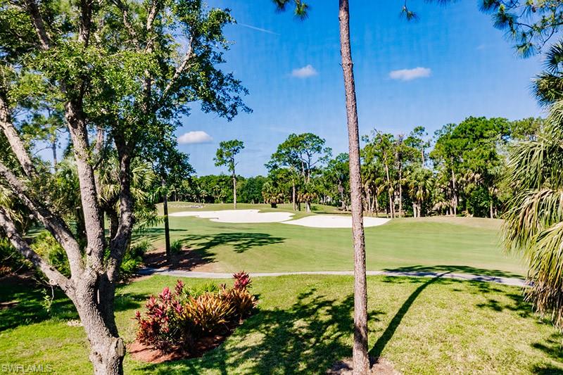 8135 Celeste Drive, Unit 4218 Naples, FL 34113 - Photo 30 of 37 View of home's community with a lawn