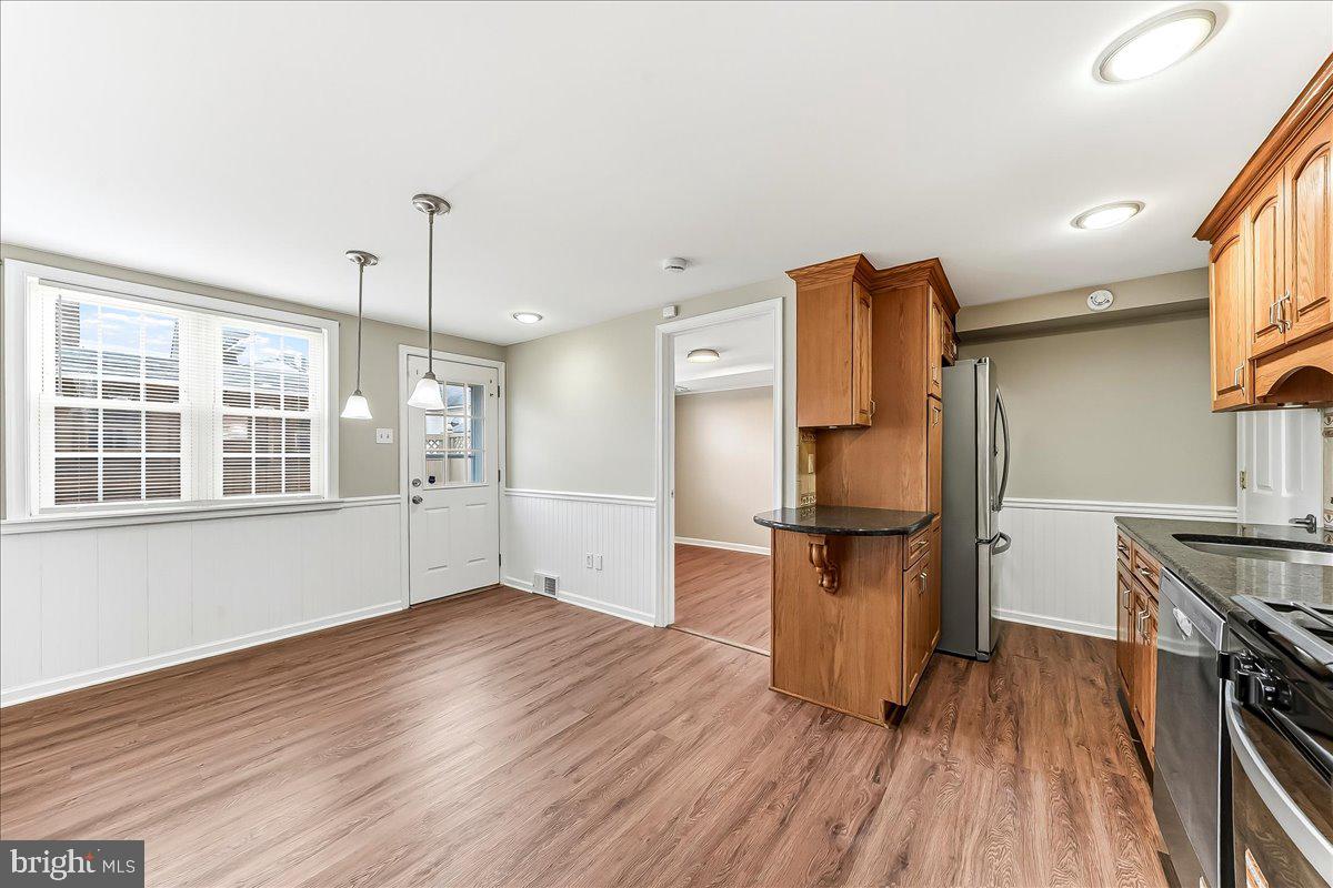 159 Chadwick Avenue Linwood, PA 19061 - Photo 12 of 35 a kitchen with stainless steel appliances granite countertop a refrigerator and a stove top oven