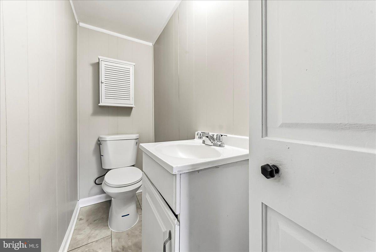 159 Chadwick Avenue Linwood, PA 19061 - Photo 18 of 35 a bathroom with a sink toilet and a window