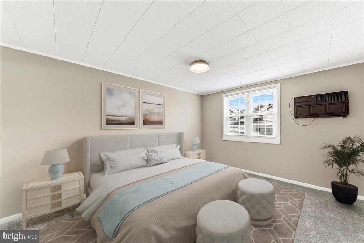 159 Chadwick Avenue Linwood, PA 19061 - Photo 19 of 35 a bedroom with a bed and a potted plant