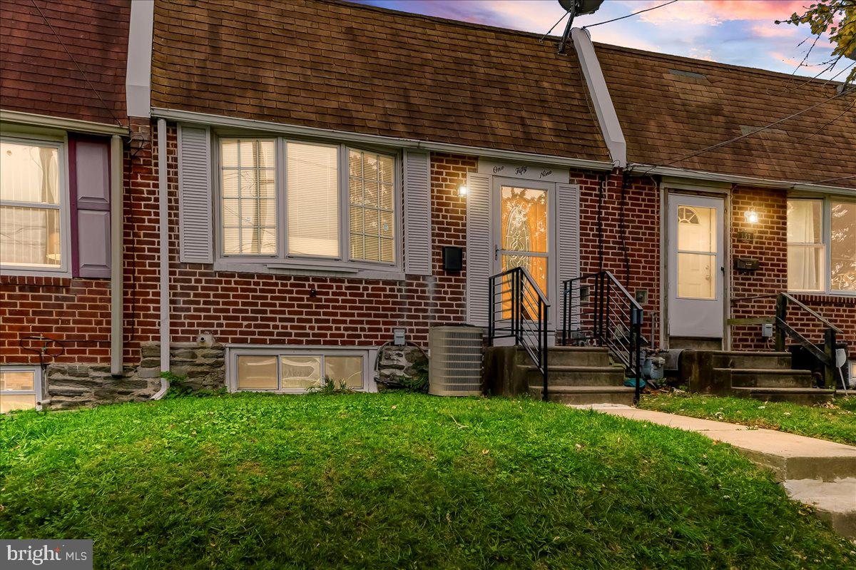 159 Chadwick Avenue Linwood, PA 19061 - Photo 2 of 35 a front view of a house with a garden