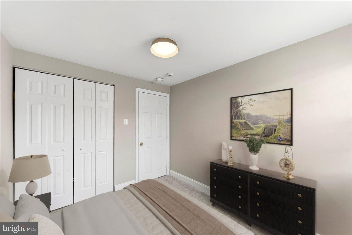 159 Chadwick Avenue Linwood, PA 19061 - Photo 23 of 35 a bedroom with a bed and a dresser