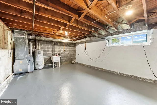 a view of a room with wooden walls