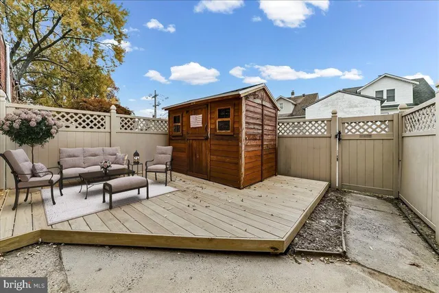 a terrace of a house with furniture
